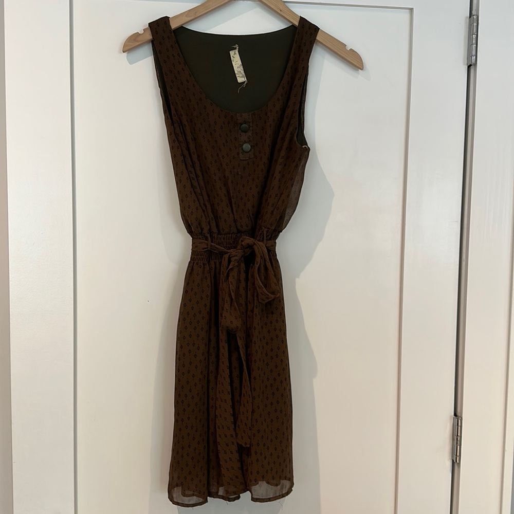 Vintage style brown sheer dress with black print.